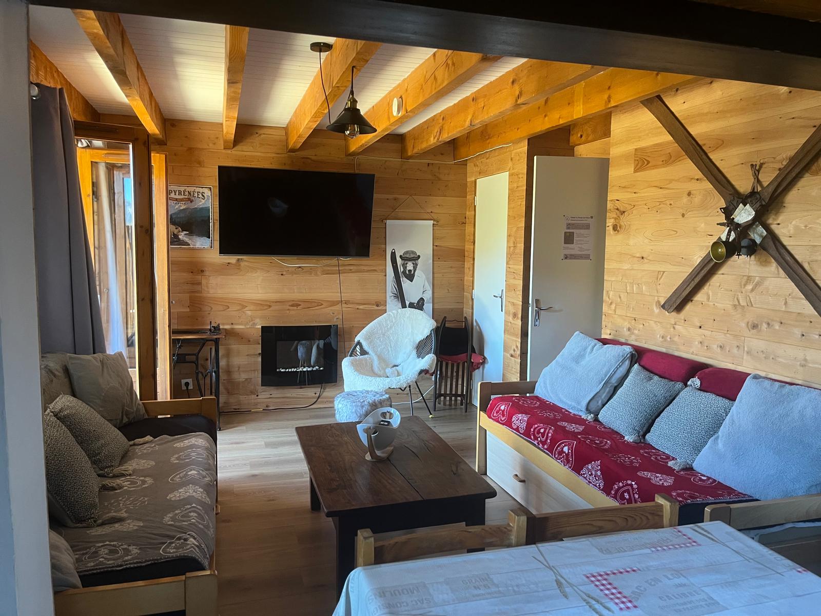 Salon chalet 10 personnes à Guzet